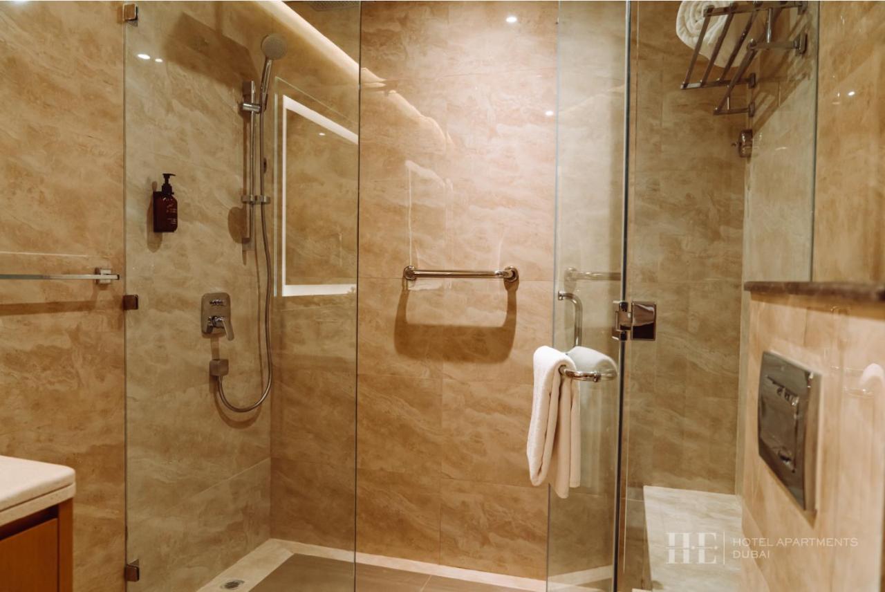 He Hotel Apartments Dubaj Pokoj fotografie A shower cubicle