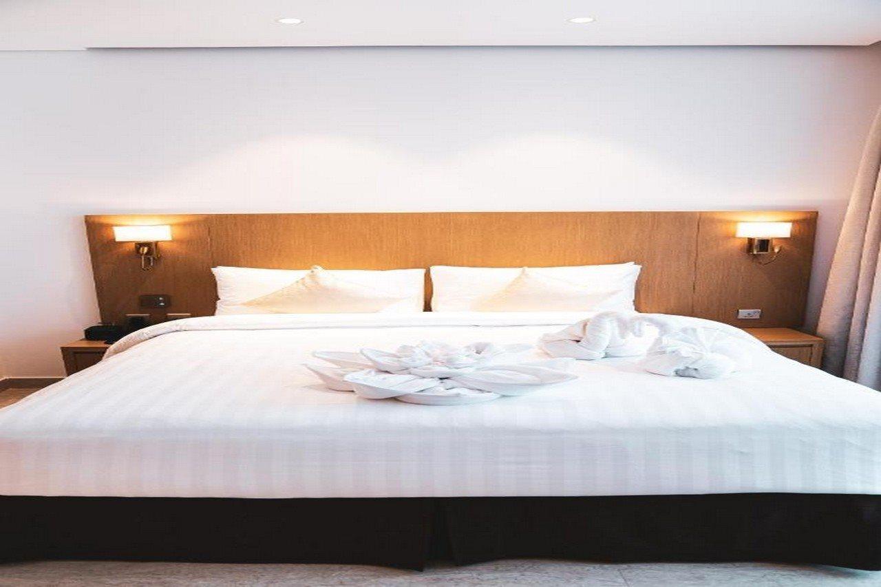 He Hotel Apartments Dubaj Exteriér fotografie A bed